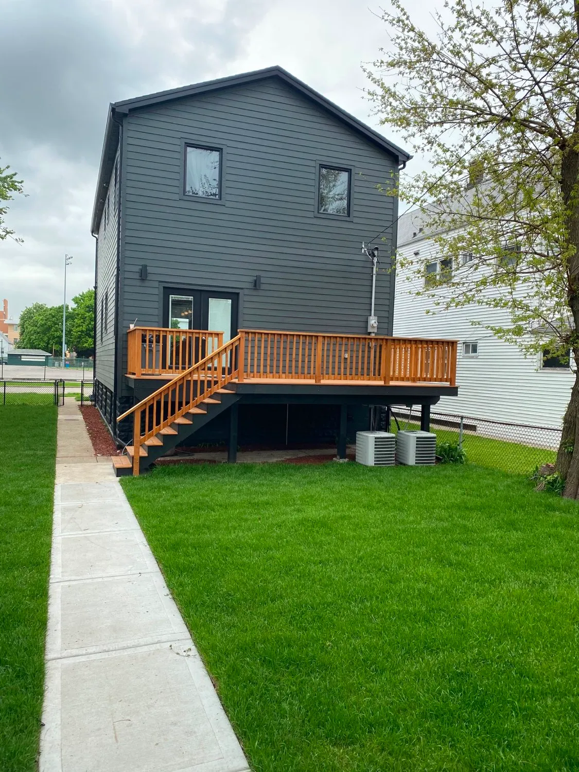 New siding with cedar deck